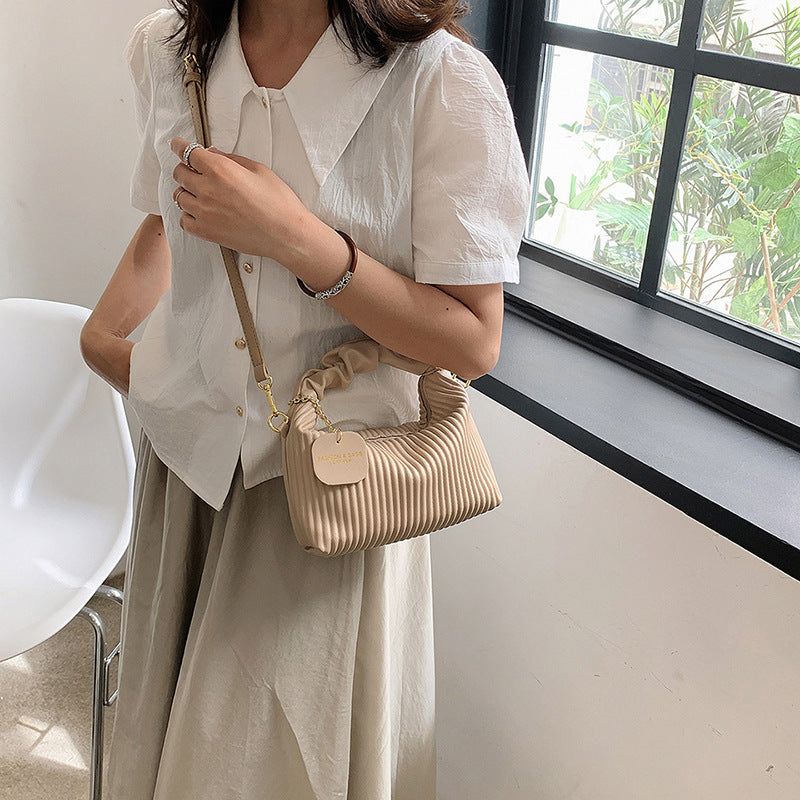 Textured vertical stripe handbag 2025 new niche design shoulder messenger bag foreign style all-match bag women's wholesale